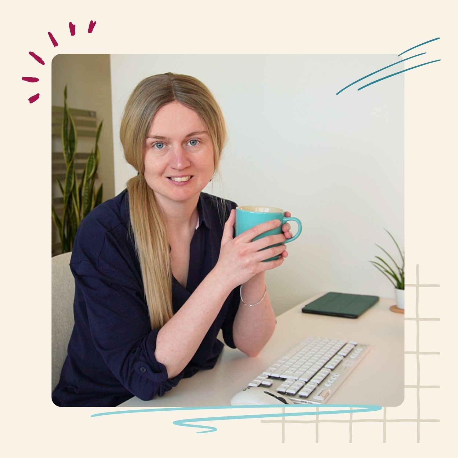 emily at desk with cup of tea
