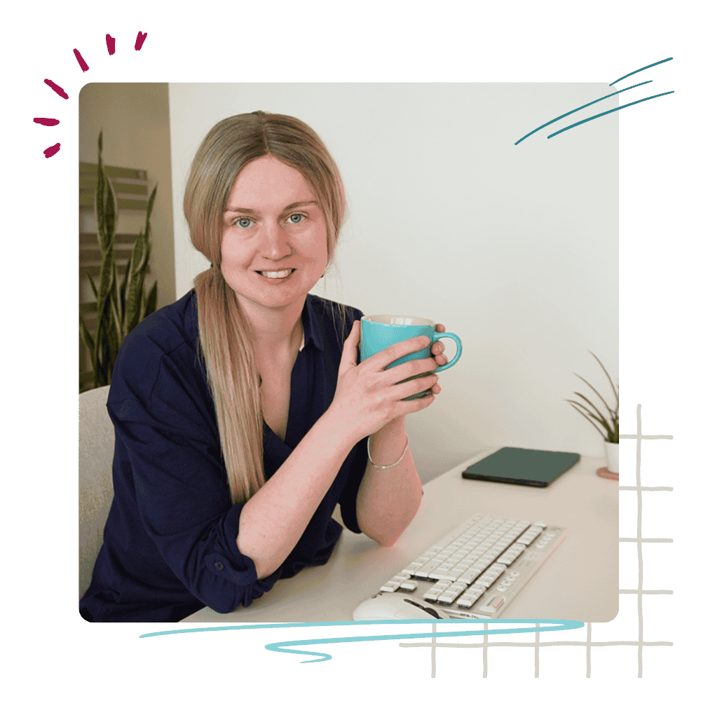 emily at desk with cup of tea
